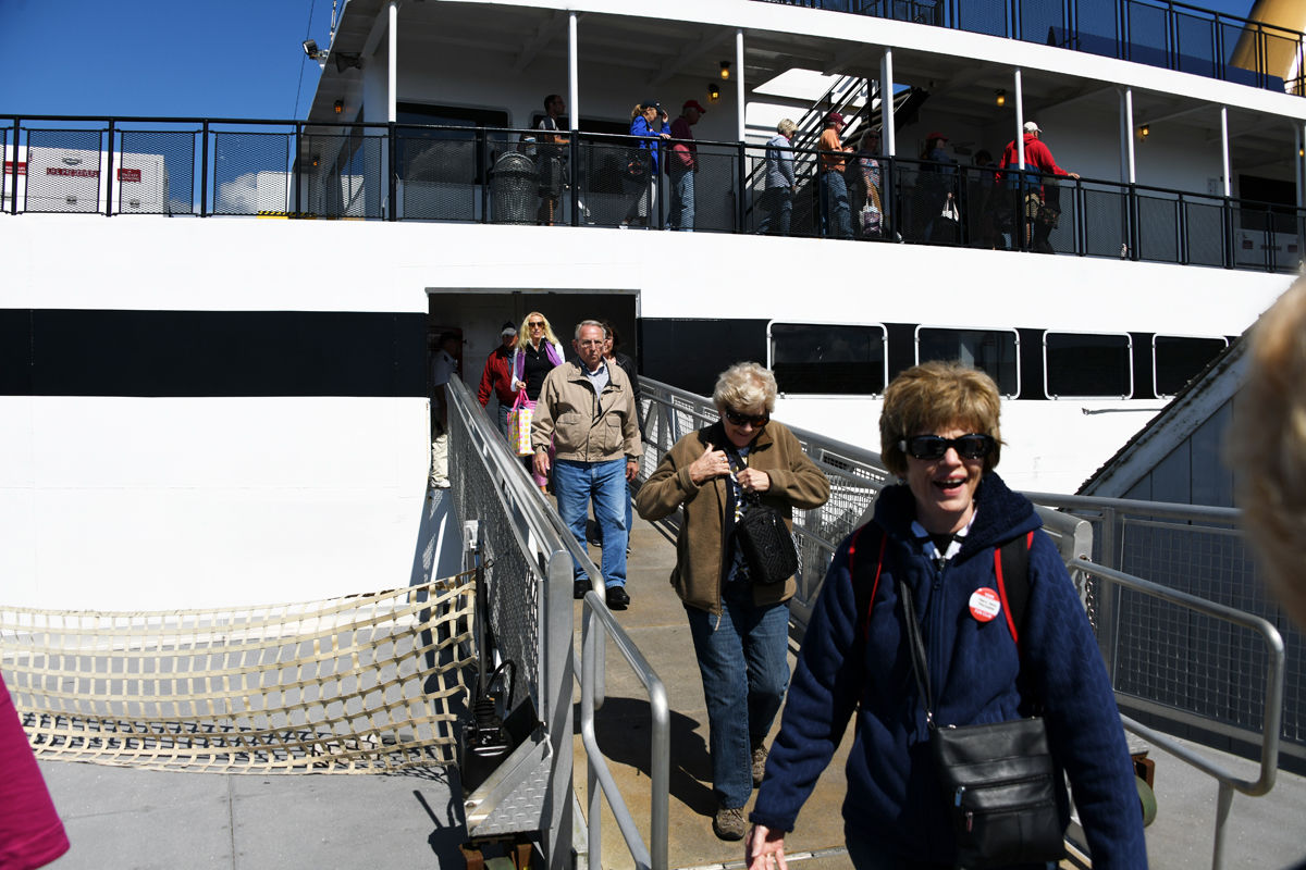 102 Mary Jane Meradith and Carolyn and Clarence Hoffman disembark the ferry and are ready to explore Nantucket Island.jpg